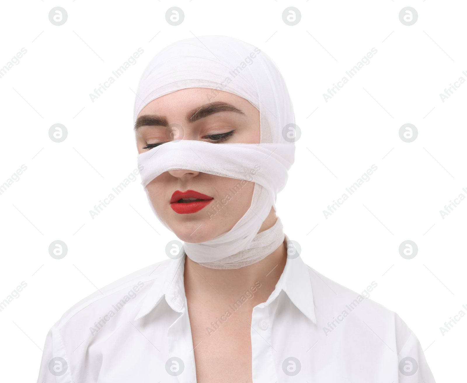 Photo of Woman with nose wrapped in medical bandage after plastic surgery operation on white background