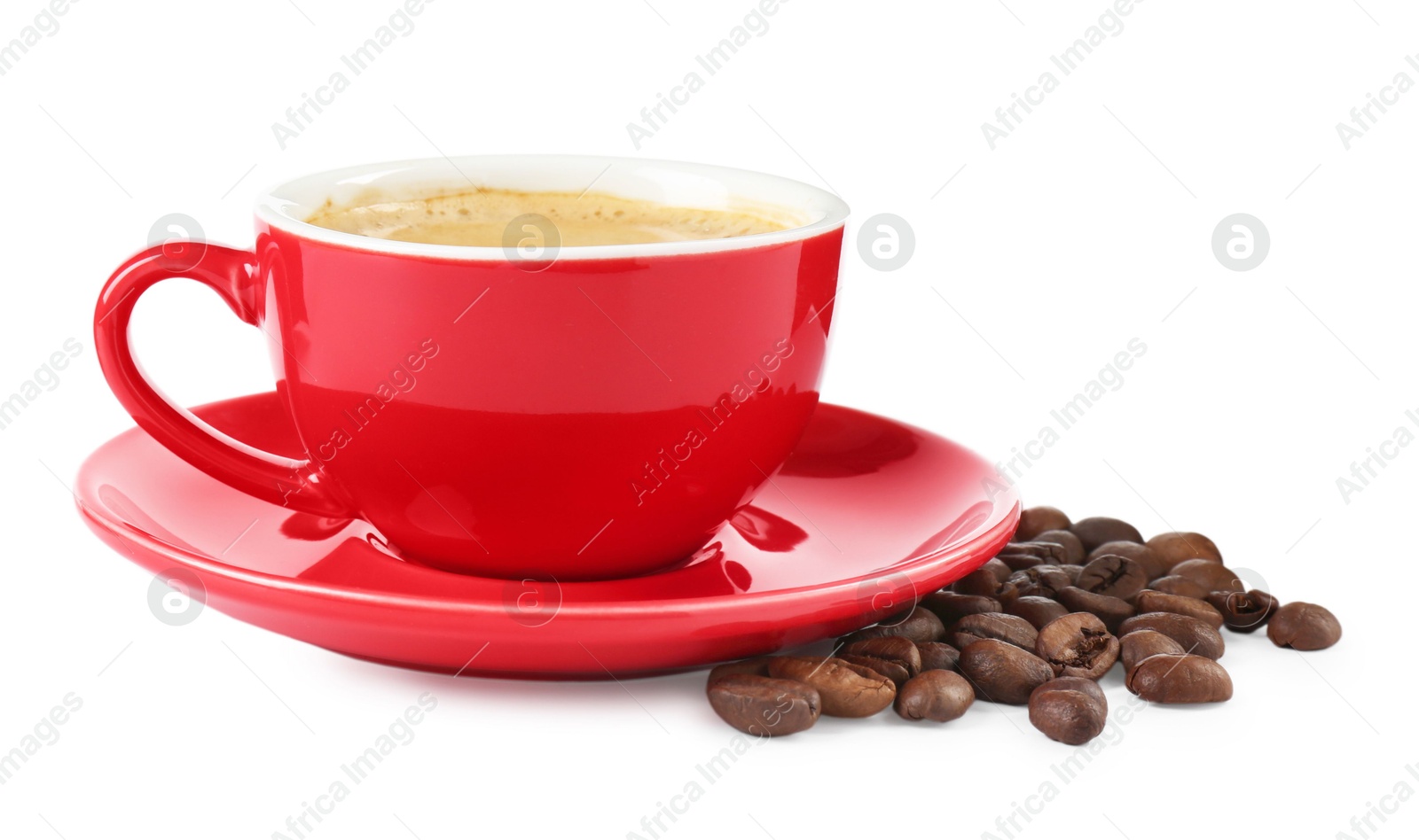 Photo of Red cup of aromatic coffee, saucer and beans isolated on white