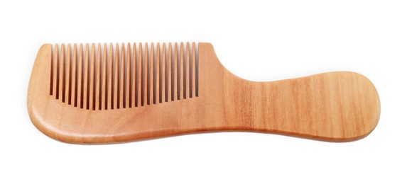 Photo of New wooden hair comb isolated on white, top view