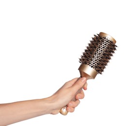 Photo of Woman with round golden hair brush on white background, closeup