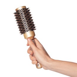 Photo of Woman with round golden hair brush on white background, closeup