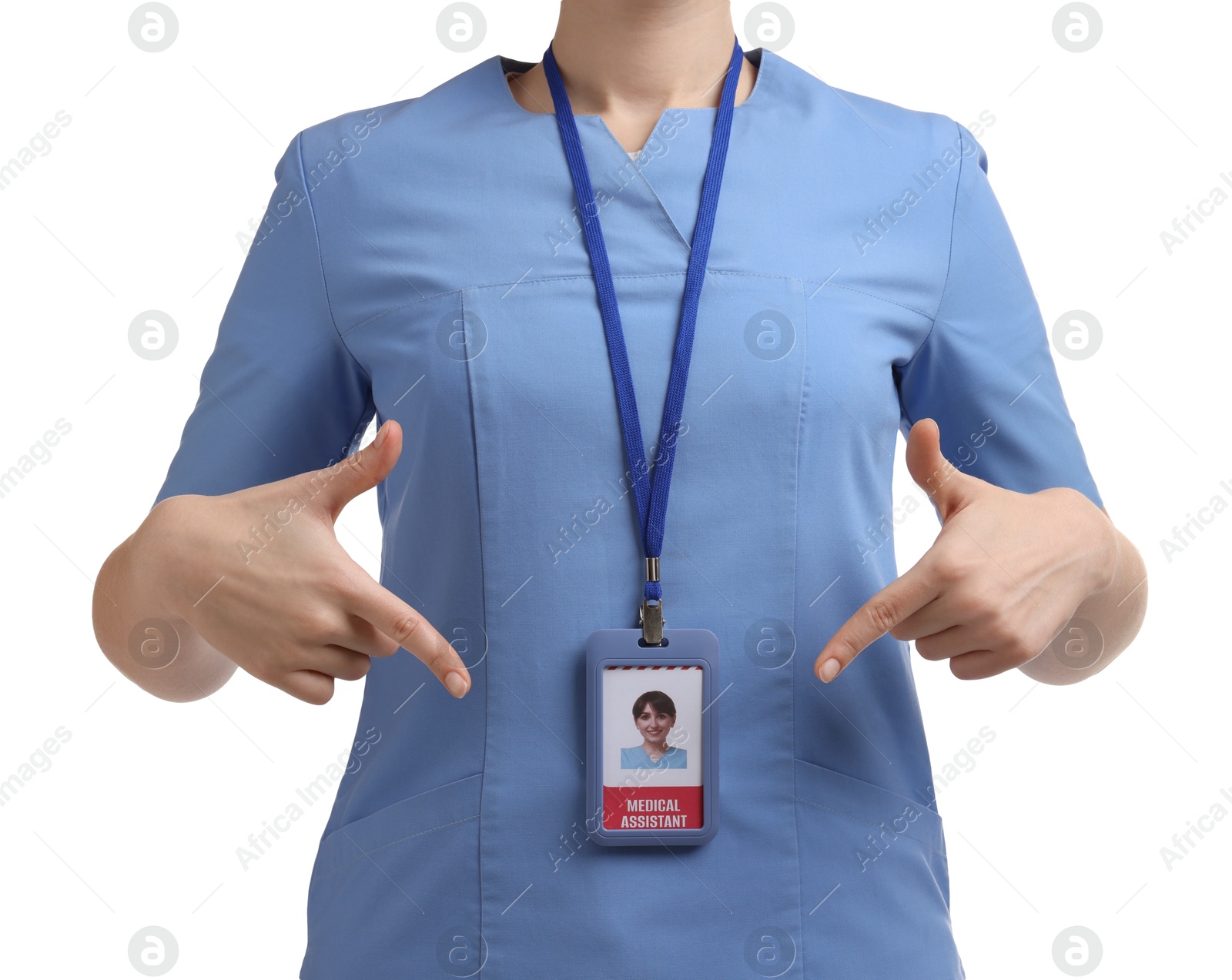 Photo of Medical assistant pointing at her badge on white background, closeup