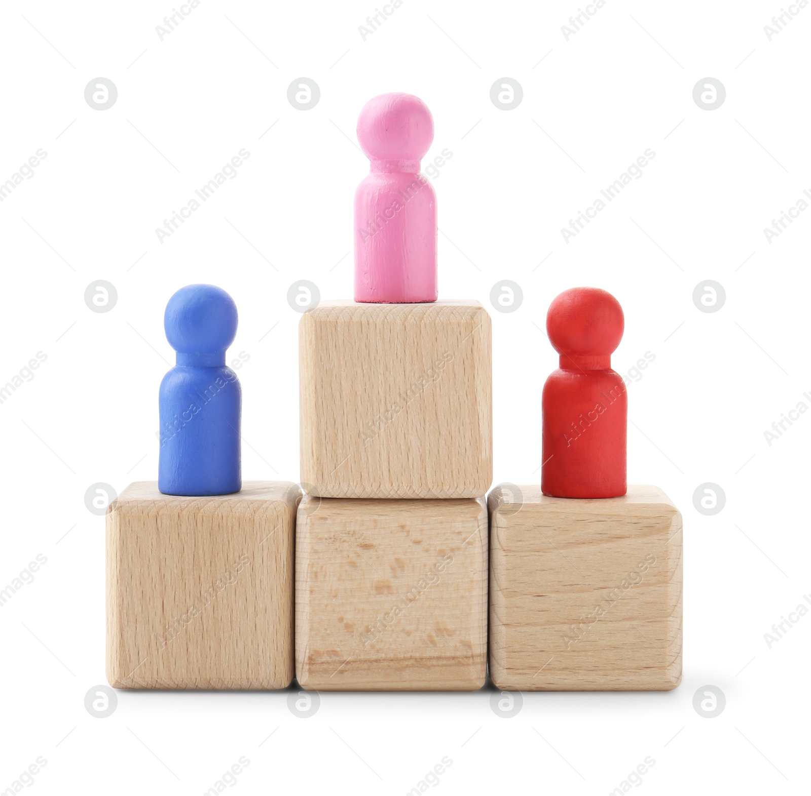 Photo of Human figures on wooden blocks, pink one on top against white background. Competition concept