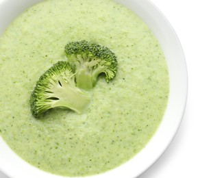 Delicious broccoli cream soup in bowl isolated on white, top view