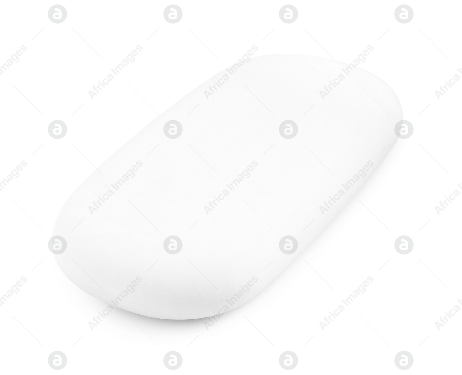 Photo of New eraser isolated on white. School stationery