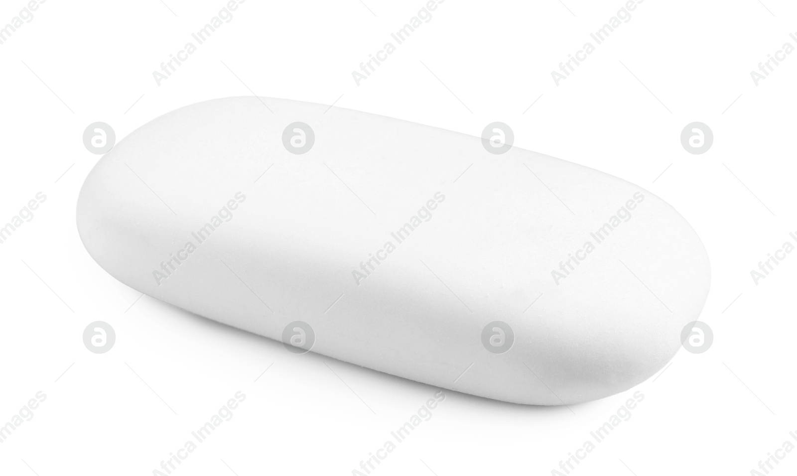 Photo of New eraser isolated on white. School stationery