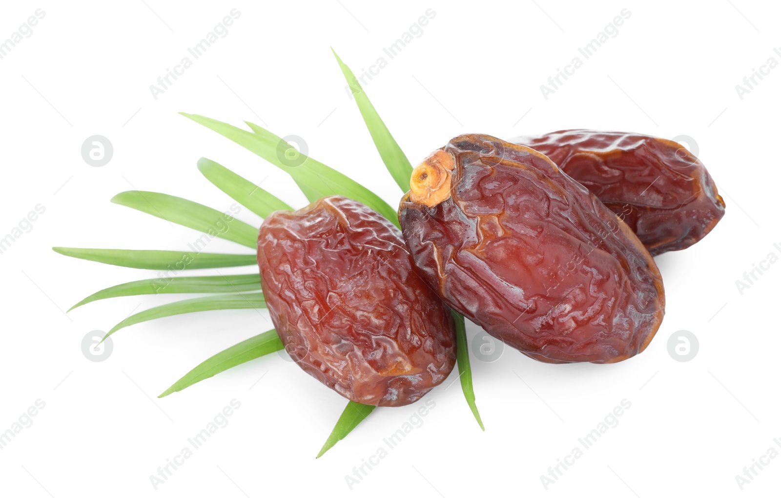 Photo of Tasty dried dates and leaf isolated on white