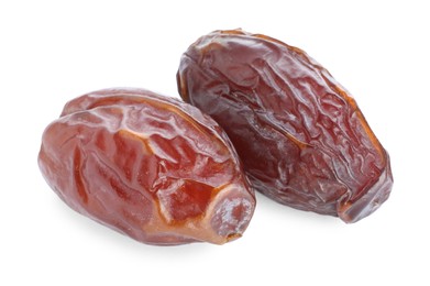 Photo of Two tasty dried dates isolated on white