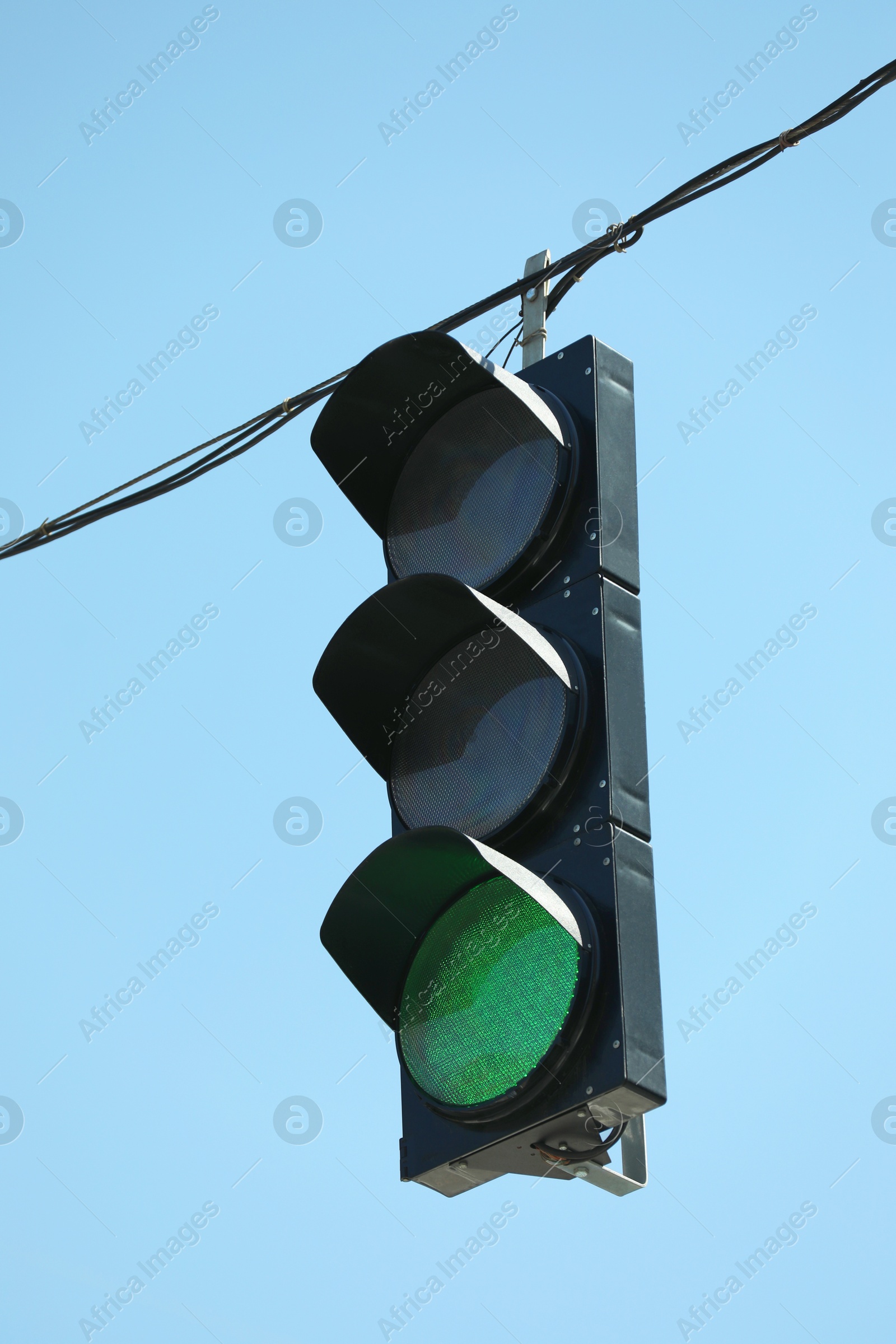 Photo of View of traffic light against blue sky