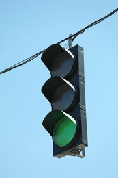 Photo of View of traffic light against blue sky