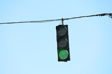 Photo of View of traffic light against blue sky