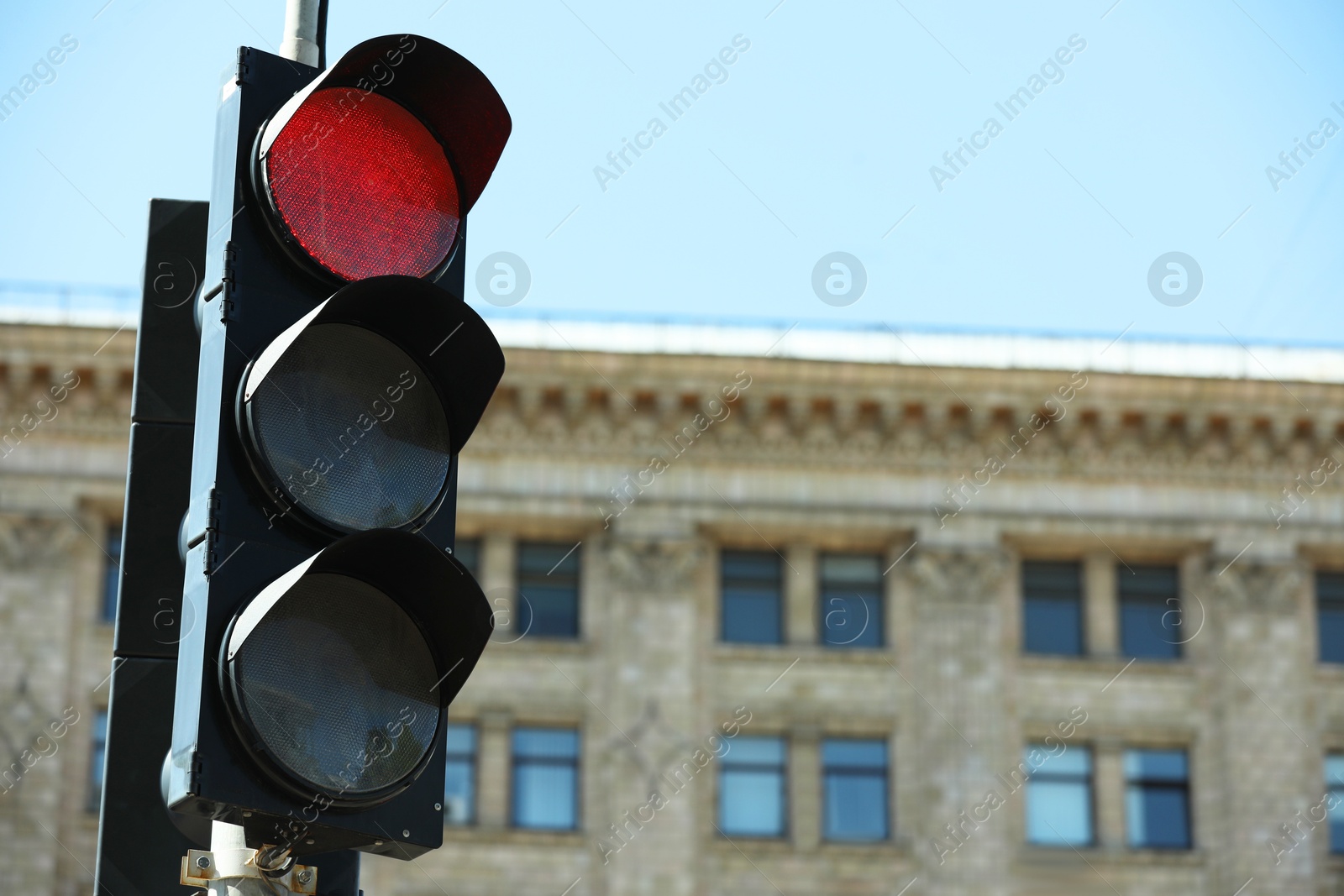 Photo of View of traffic light in city on sunny day, space for text