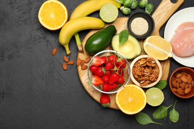 Photo of Different fresh products rich in dopamine on grey textured table, flat lay. Space for text