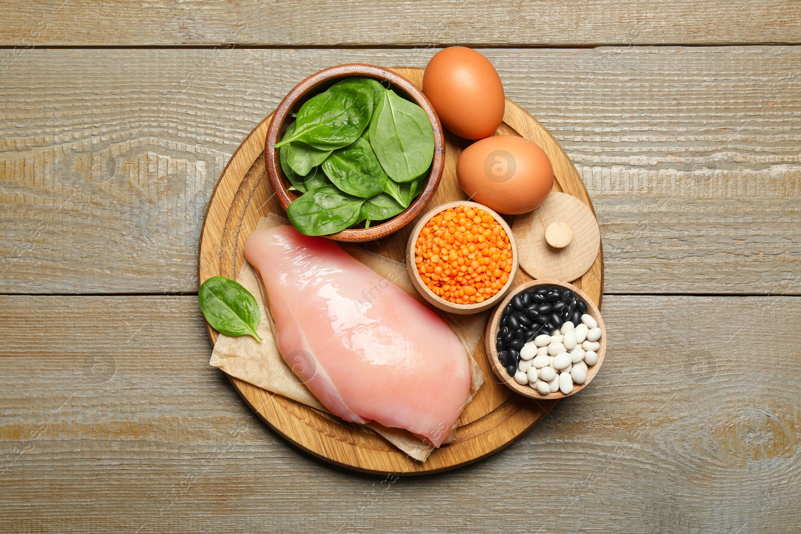 Photo of Different products rich in estrogen on wooden table, top view