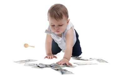 Photo of Little baby with money on white background