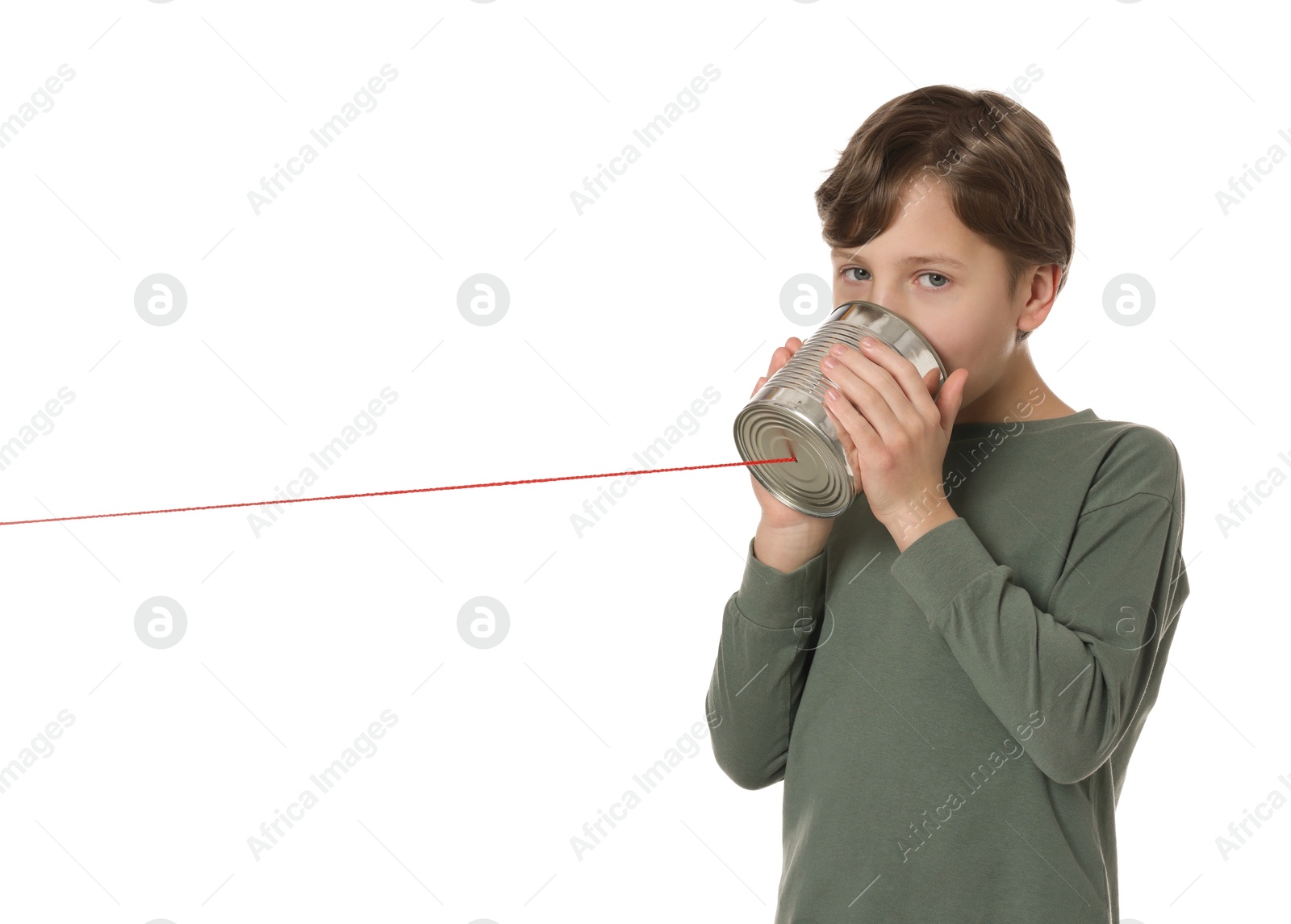 Photo of Boy using tin can telephone on white background