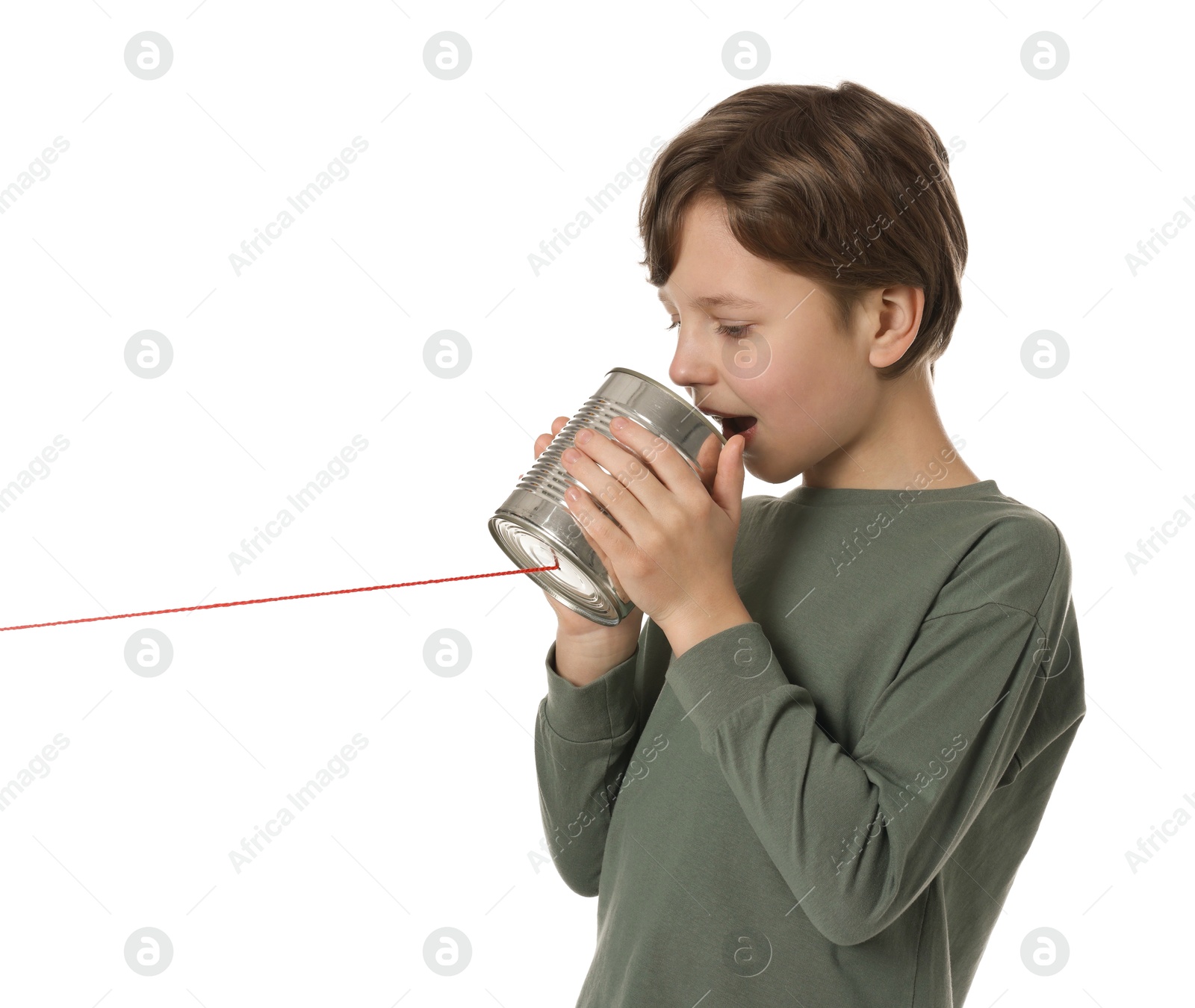 Photo of Boy using tin can telephone on white background