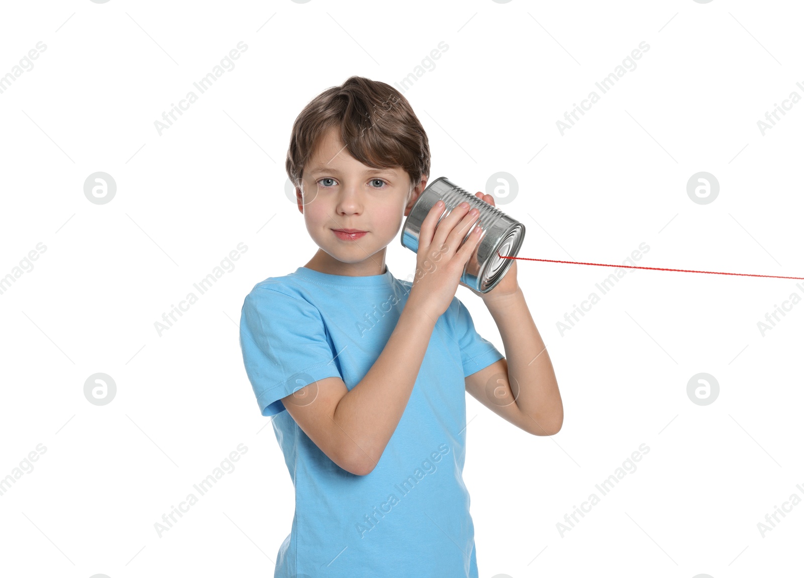 Photo of Boy using tin can telephone on white background