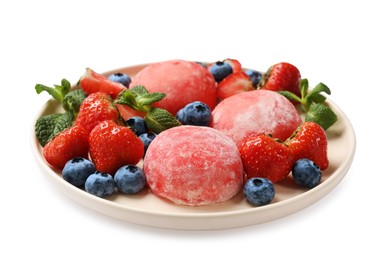 Photo of Delicious mochi, strawberries, blueberries and mint isolated on white