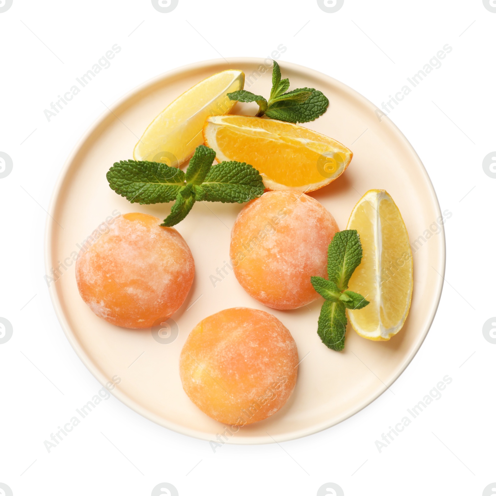 Photo of Plate with tasty mochi, cut orange, lemon and mint isolated on white, top view