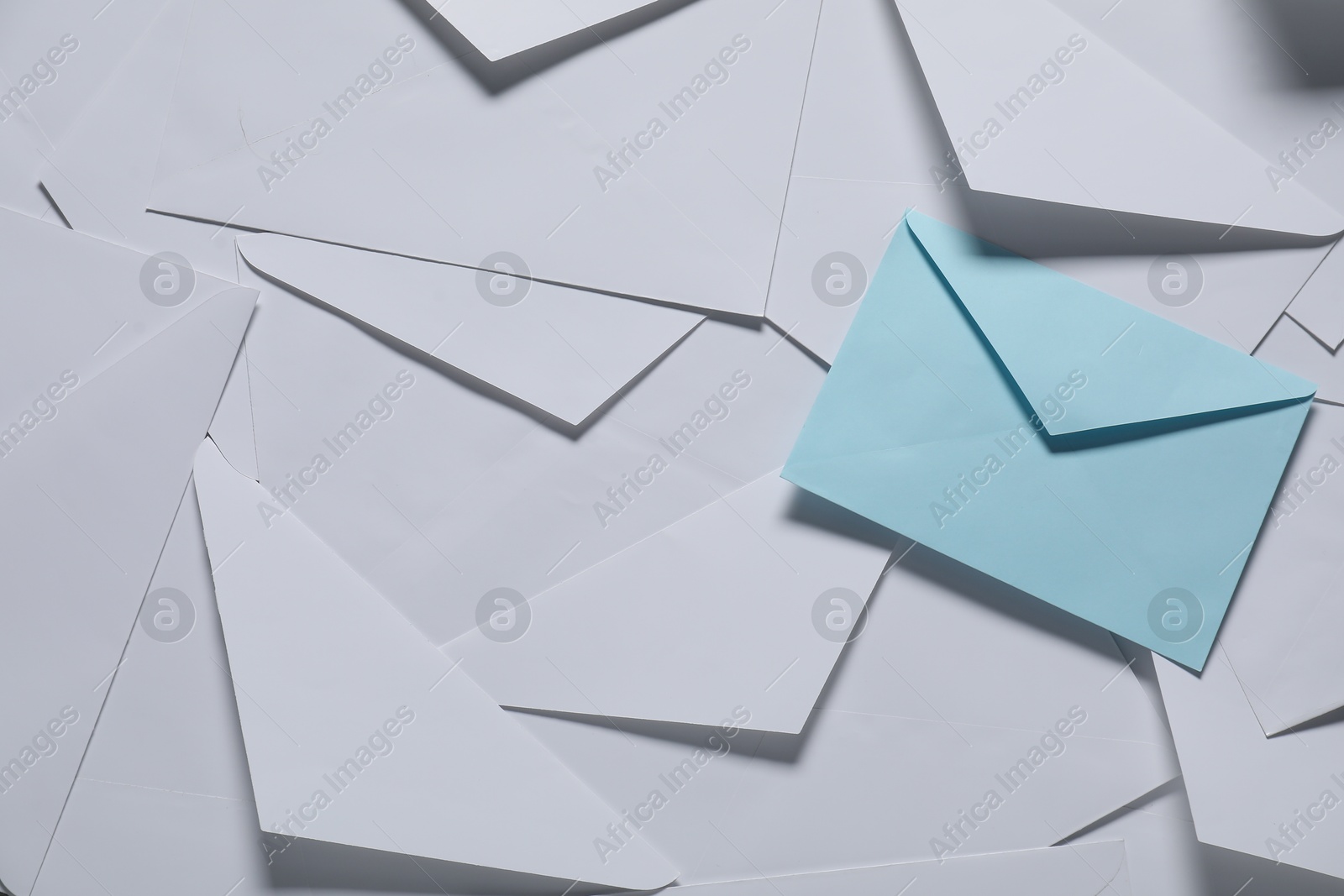 Photo of Paper envelopes as background, top view. Mockup for design