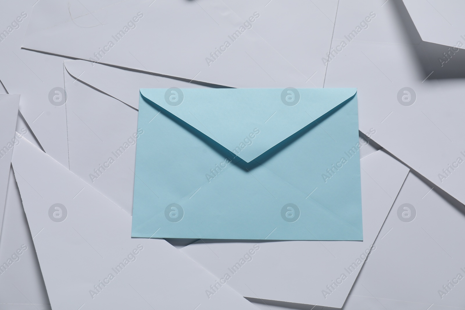 Photo of Paper envelopes as background, top view. Mockup for design