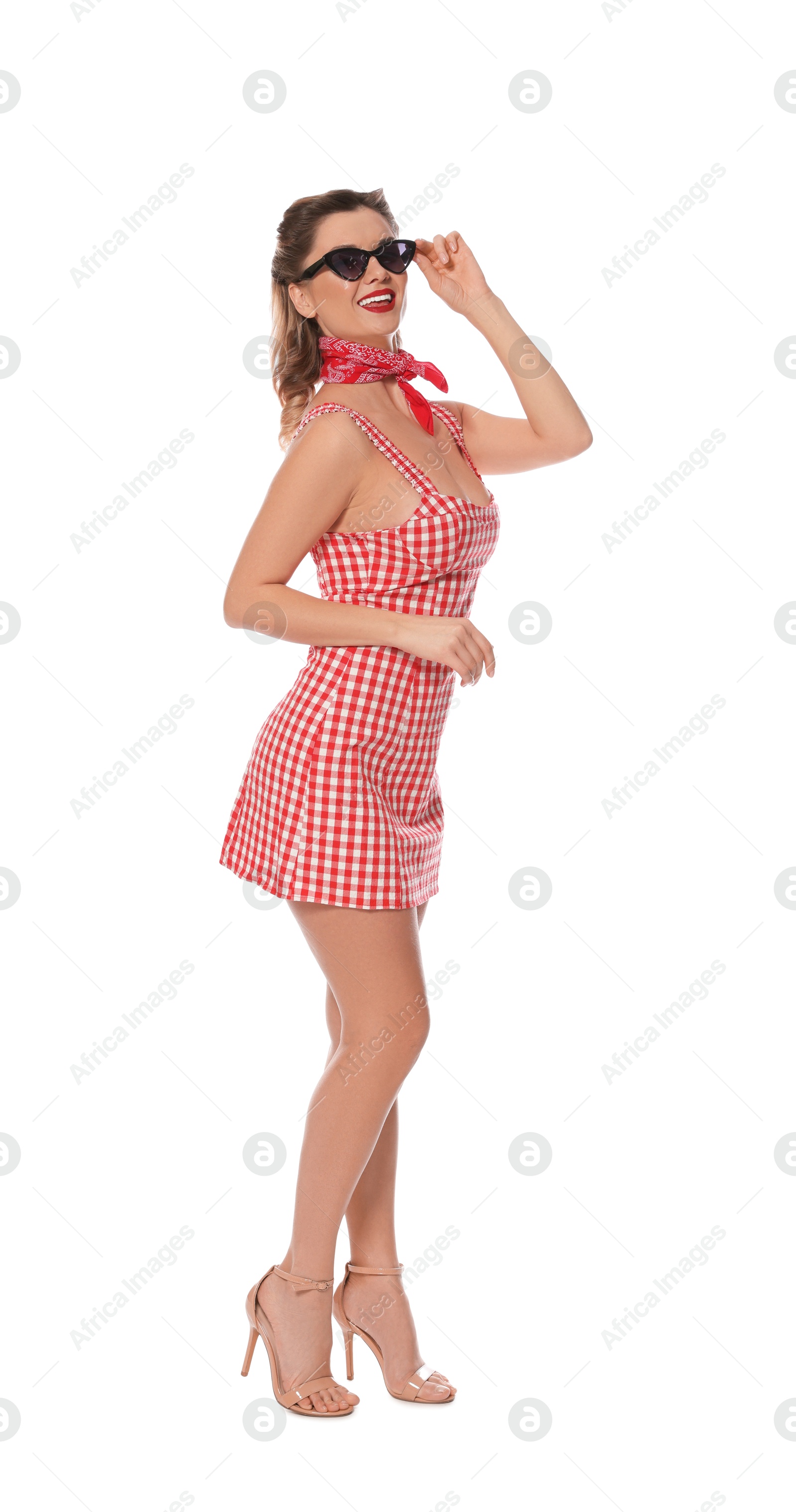 Photo of Happy pin-up woman in dress posing on white background