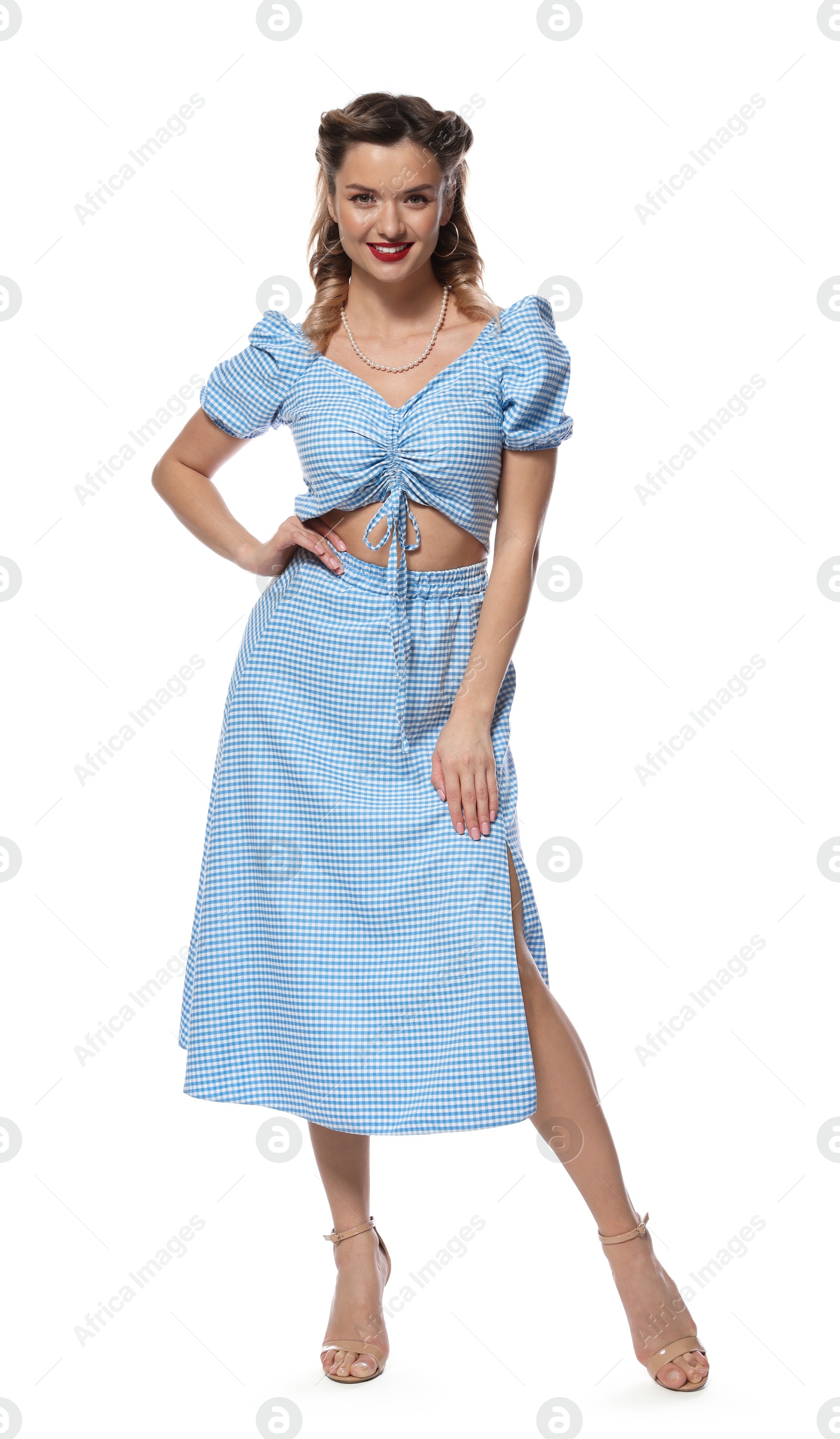 Photo of Happy pin-up woman posing on white background