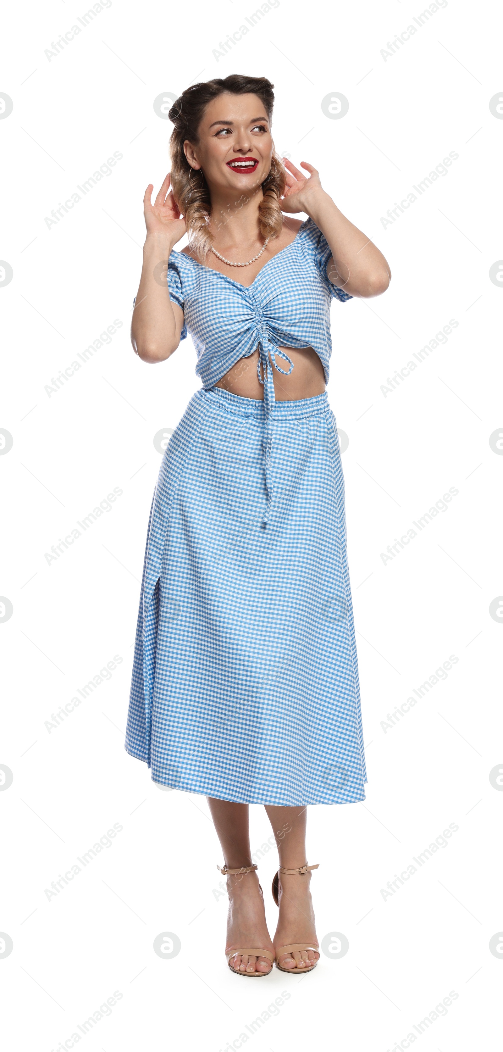 Photo of Happy pin-up woman posing on white background