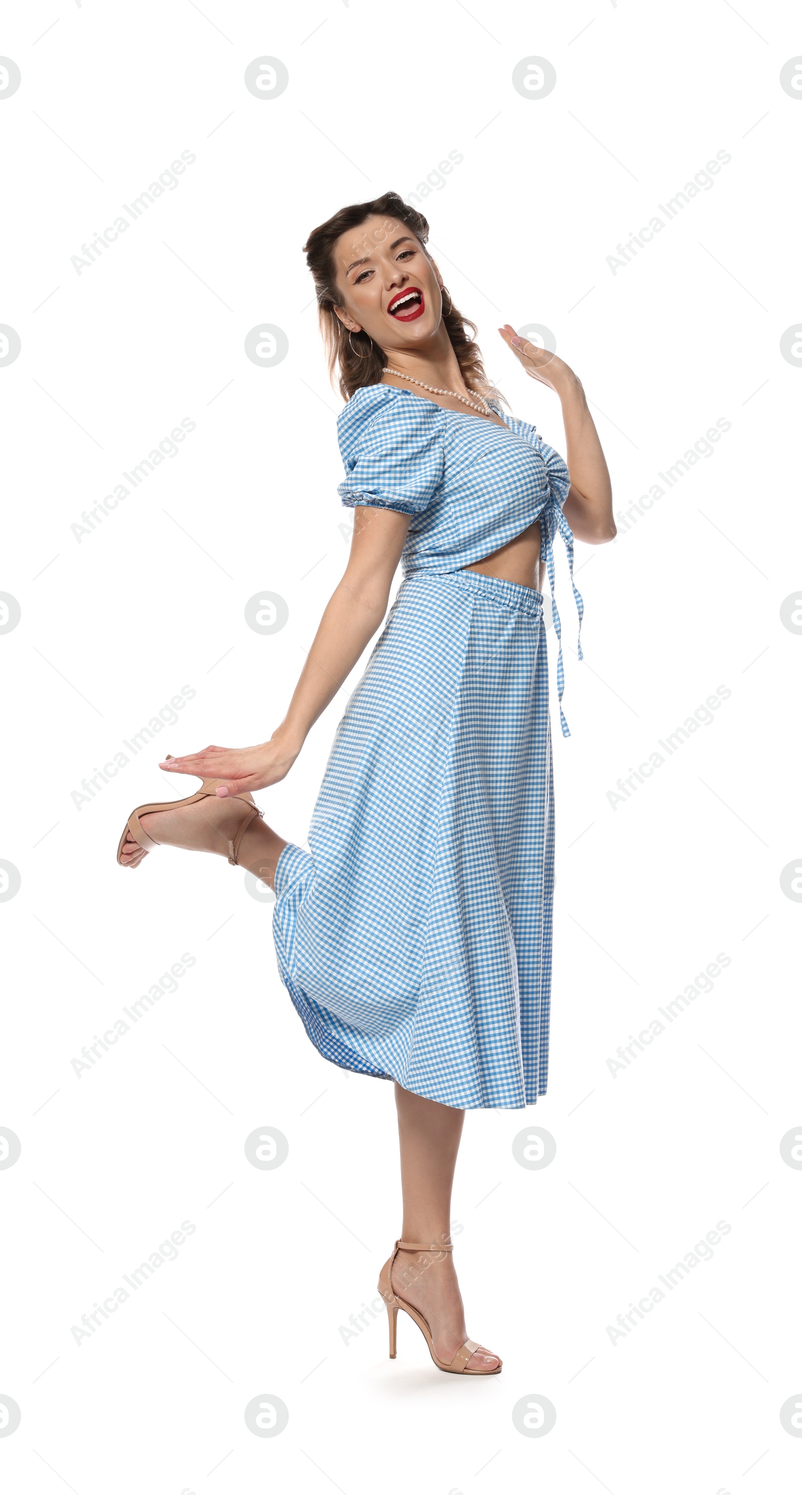 Photo of Happy pin-up woman posing on white background