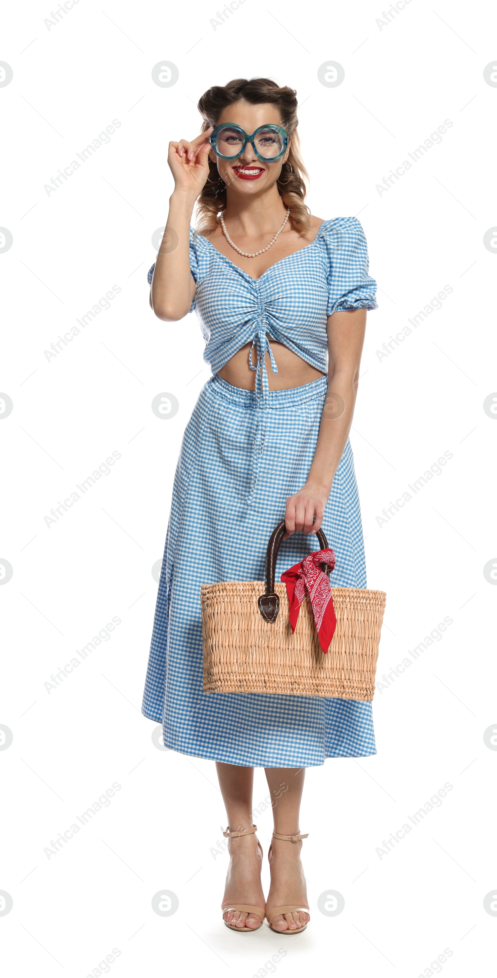 Photo of Happy pin-up woman posing on white background