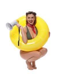 Photo of Happy pin-up woman in swimsuit with megaphone and inflatable ring on white background