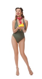 Photo of Happy pin-up woman in swimsuit with rubber duck on white background