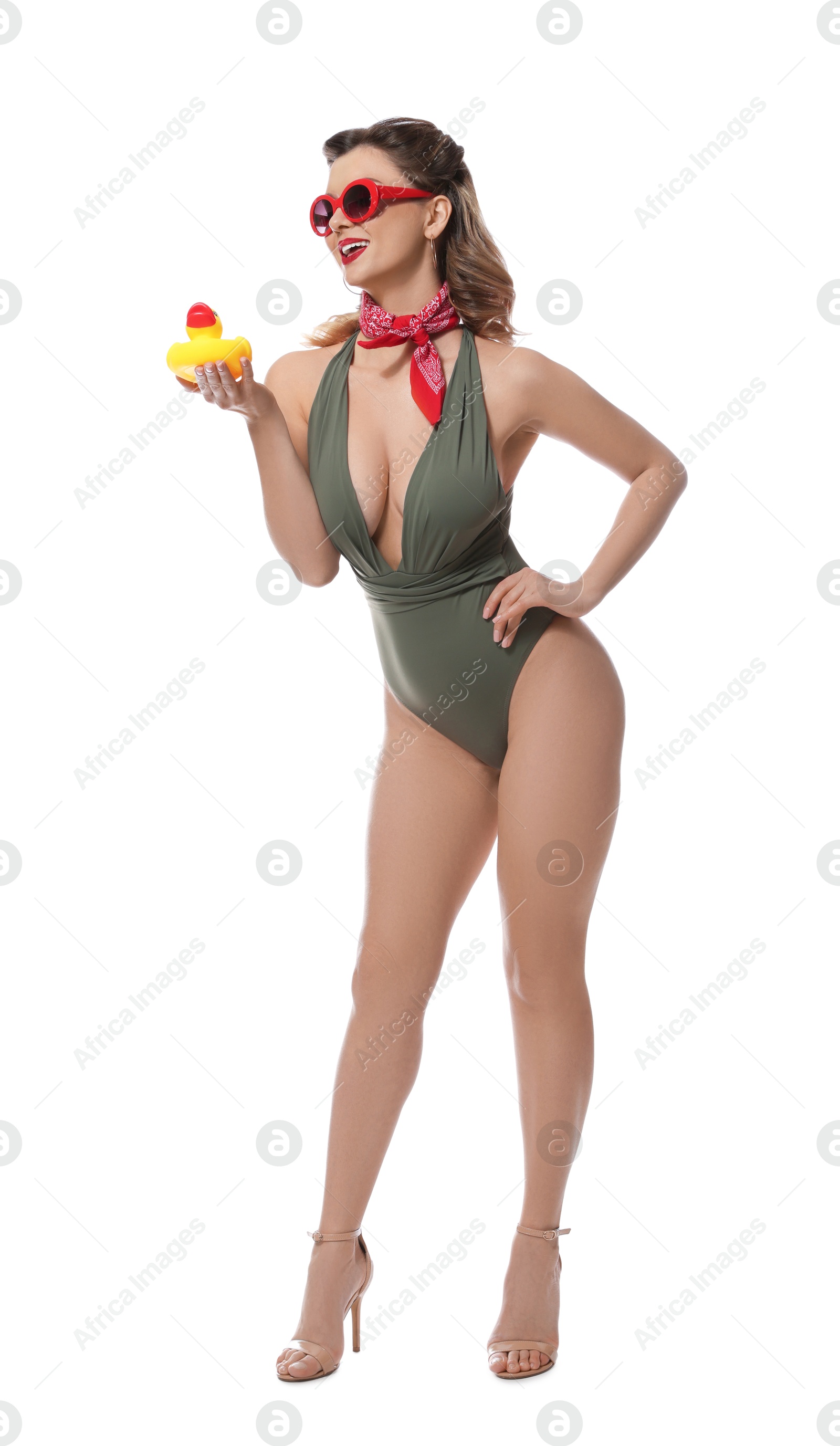 Photo of Happy pin-up woman in swimsuit with rubber duck on white background