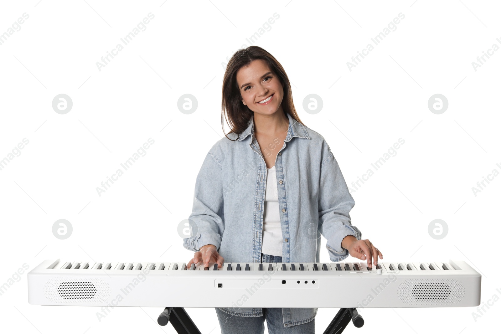 Photo of Smiling woman playing synthesizer on white background