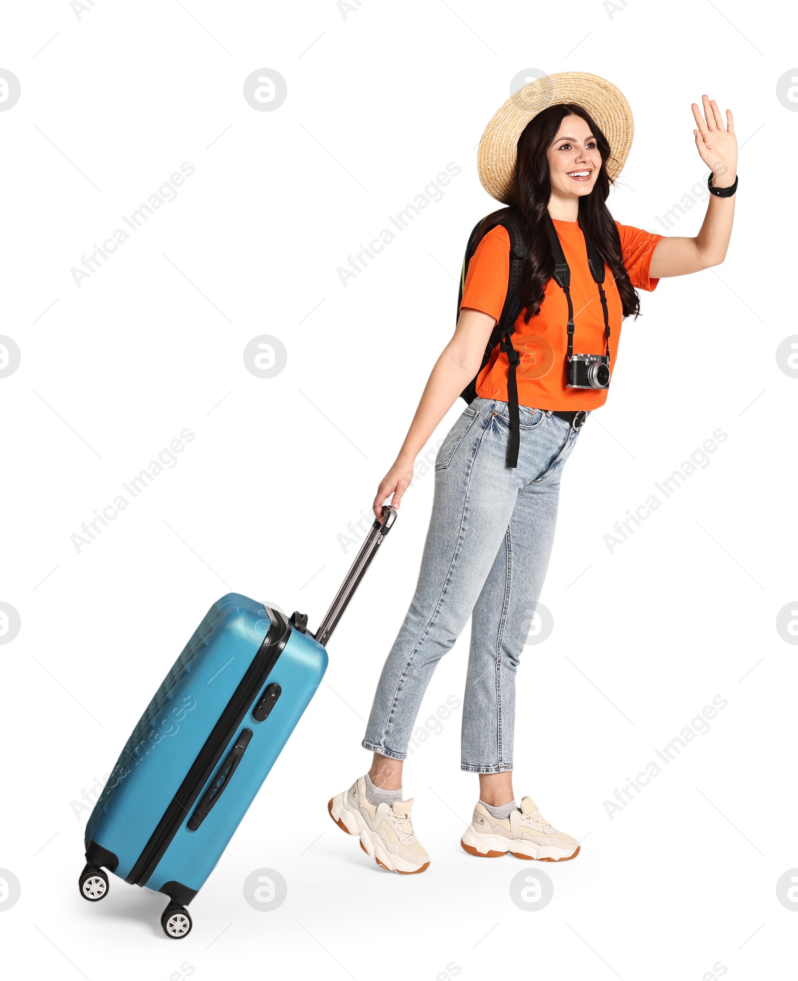 Photo of Young tourist in hat with camera, suitcase and backpack on white background