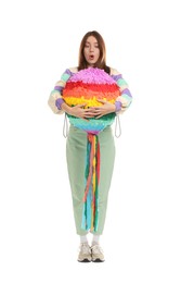 Emotional woman with colorful pinata isolated on white