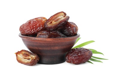 Photo of Tasty dried dates and leaf in bowl isolated on white