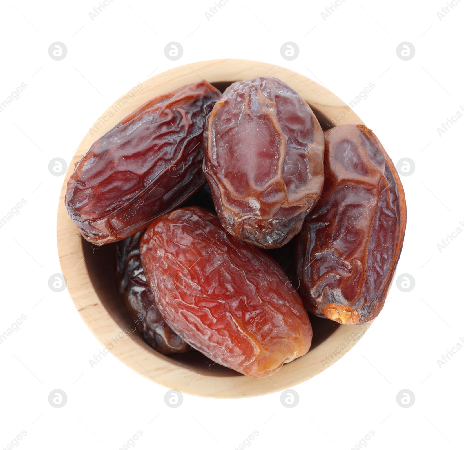 Photo of Tasty dried dates in bowl isolated on white, top view