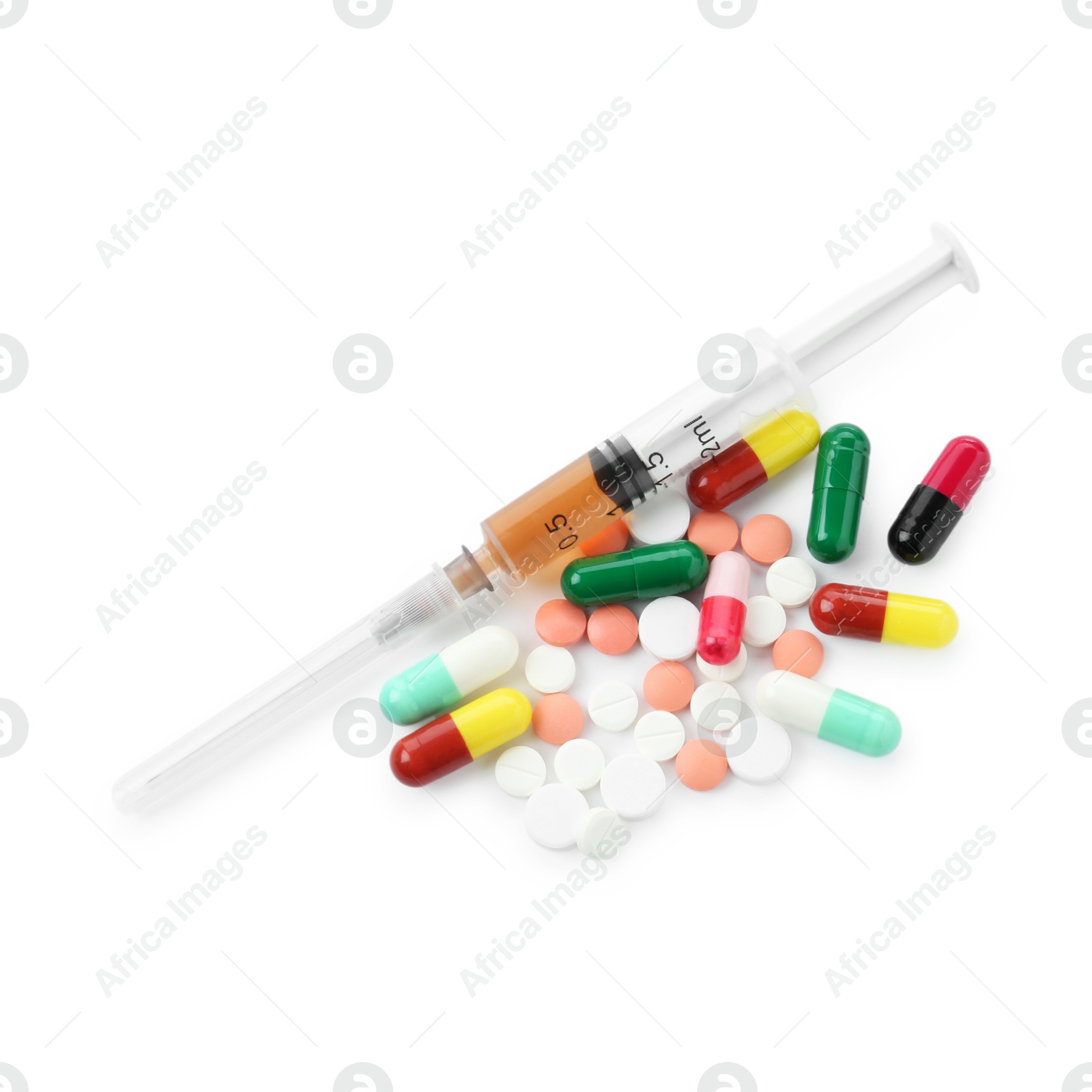 Photo of Drug addiction. Different pills and syringe isolated on white, top view