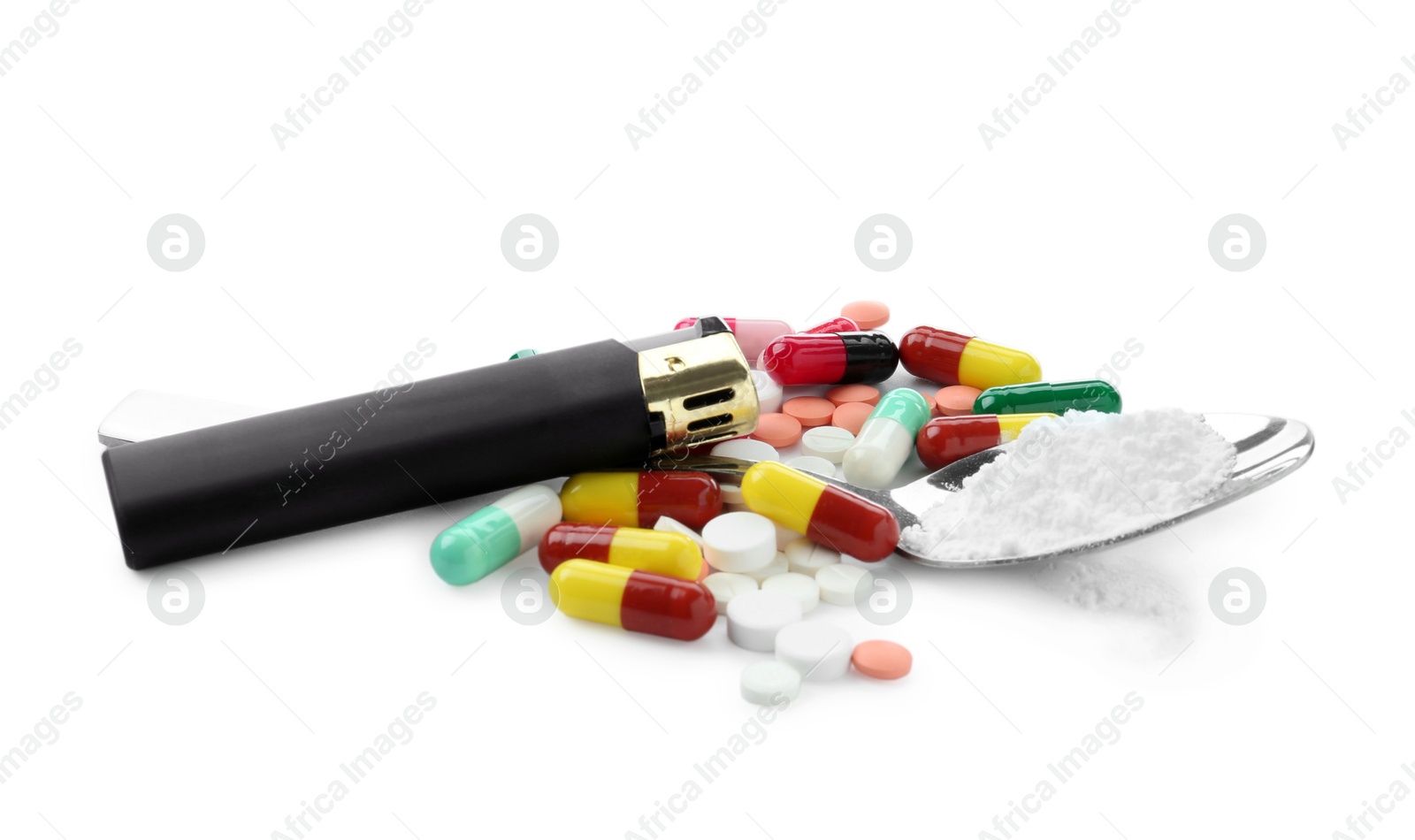 Photo of Drug addiction. Different pills, spoon with powder and cigarette lighter isolated on white