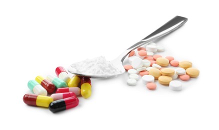 Photo of Drug addiction. Different pills and spoon with powder isolated on white