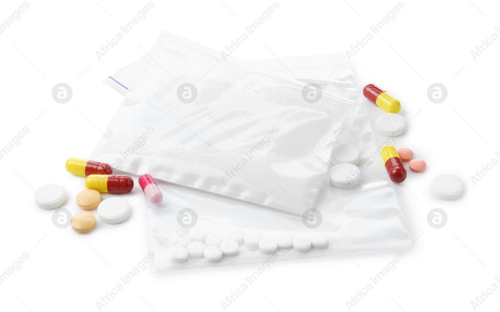 Photo of Drug addiction. Different pills and plastic bag with isolated on white