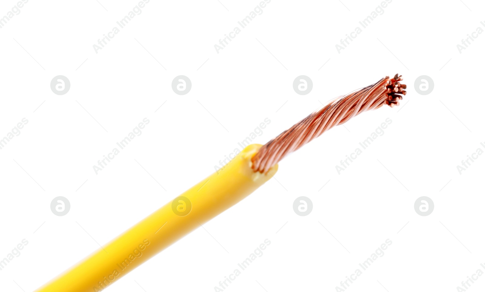 Photo of Yellow stripped electrical wire on white background