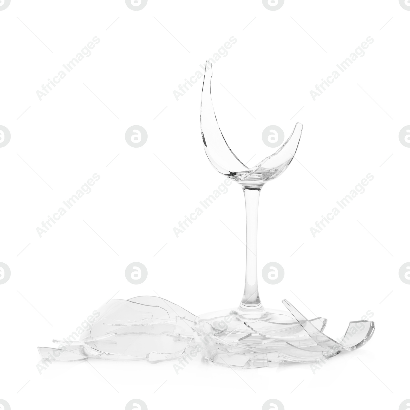 Photo of Pieces of broken wine glass isolated on white