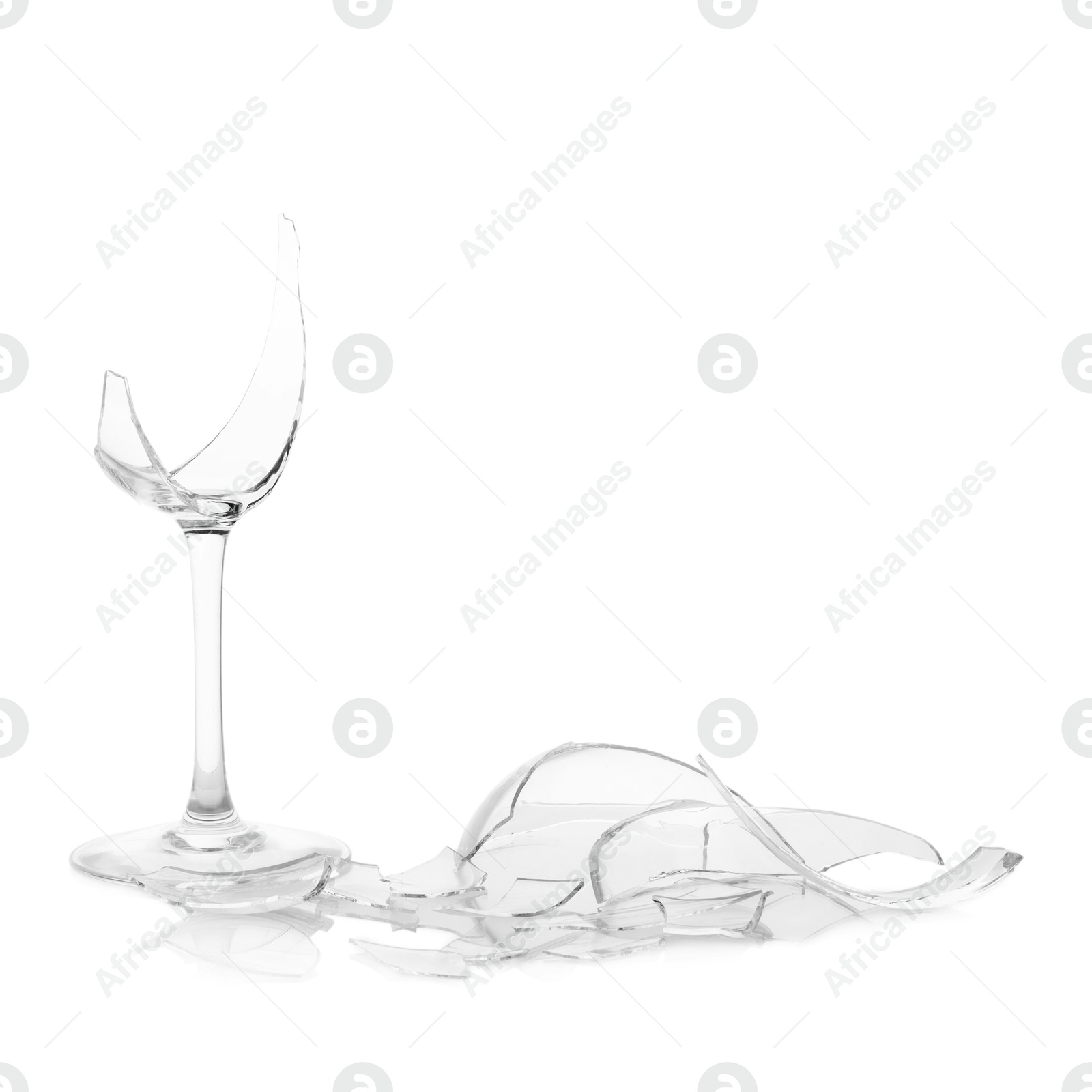 Photo of Pieces of broken wine glass isolated on white