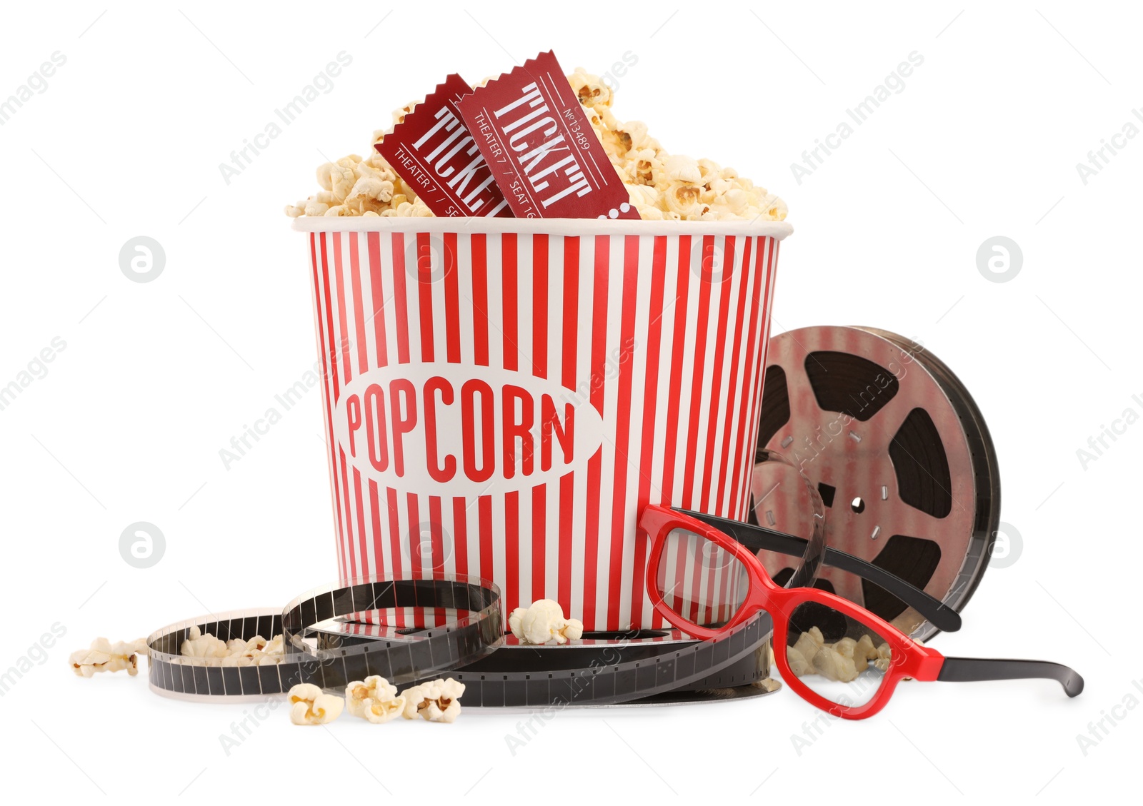 Photo of Tasty popcorn, film reel, glasses and movie tickets isolated on white