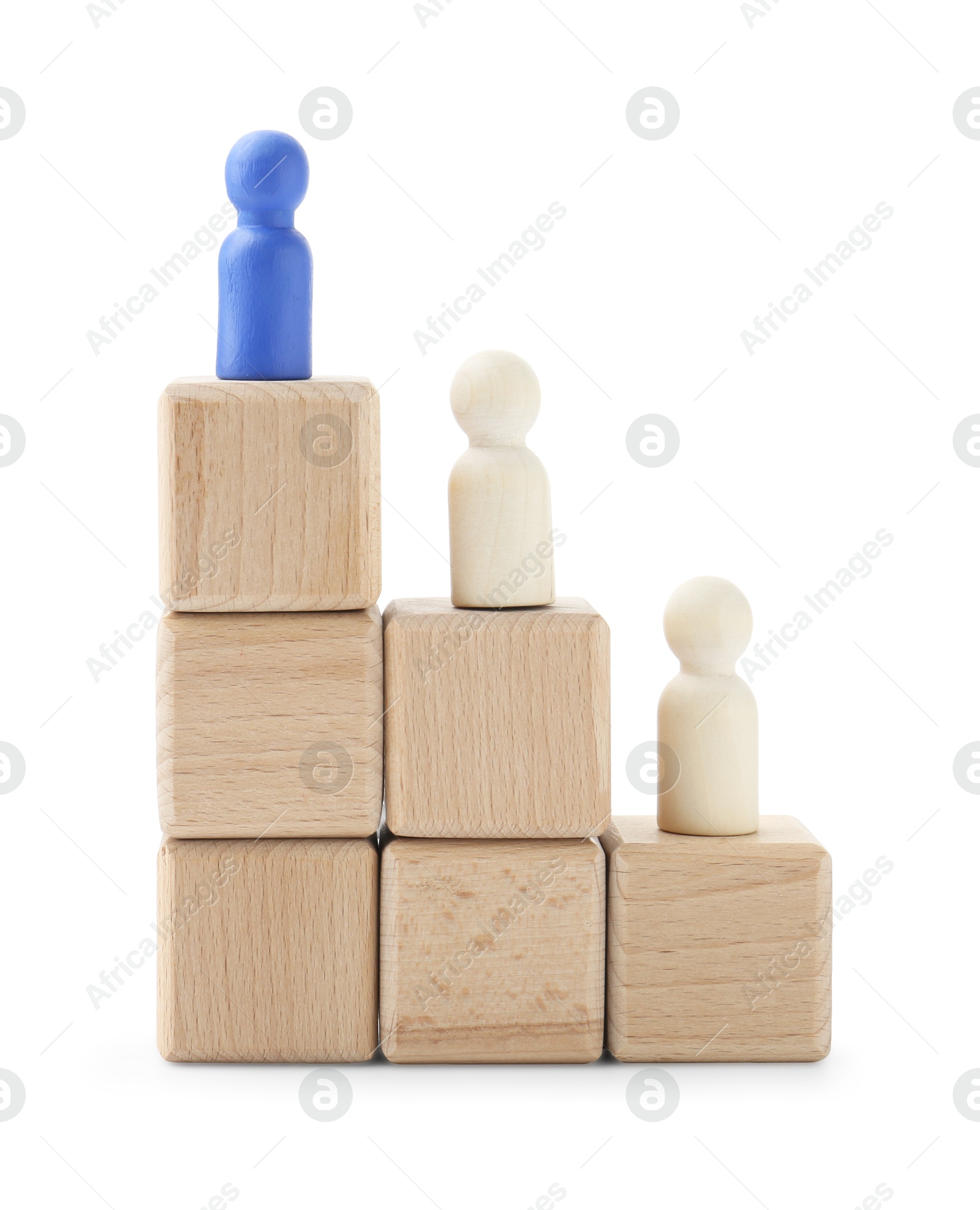 Photo of Human figures on wooden blocks, blue one on top against white background. Competition concept