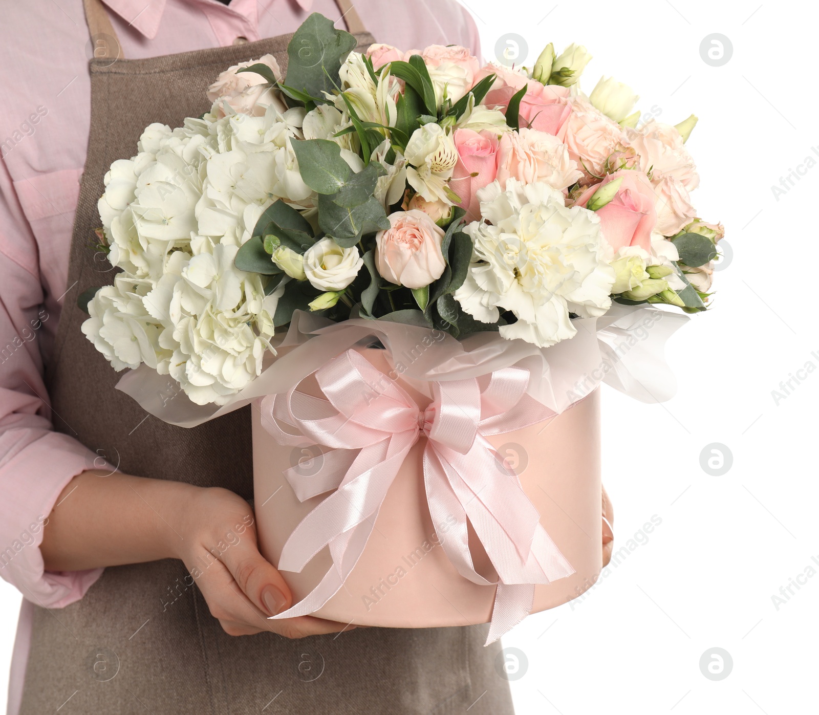 Photo of Florist with beautiful bouquet in box on white background, closeup