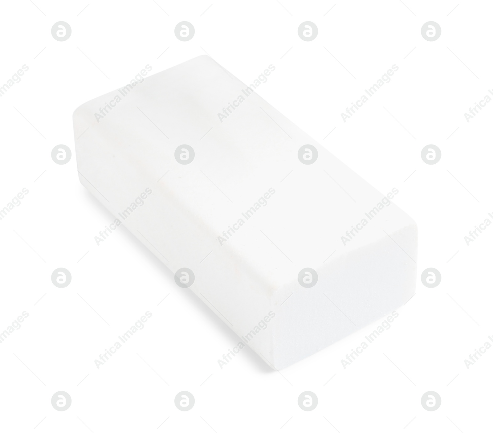 Photo of New eraser isolated on white. School stationery